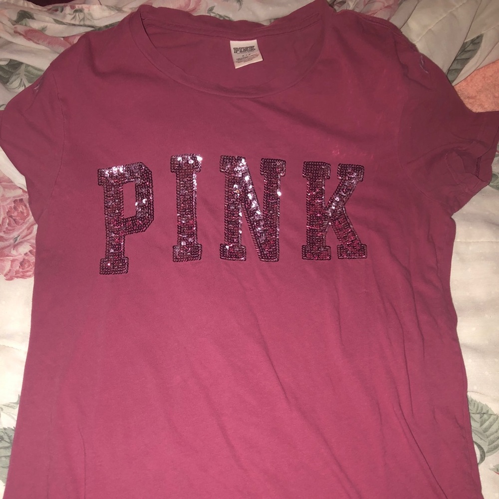 I’m selling a cute pink Victoria secret Pink shirt